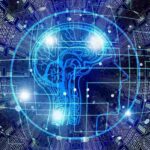 Digital human head profile overlaid with a glowing blue brain and circuit board patterns, representing artificial intelligence and machine learning