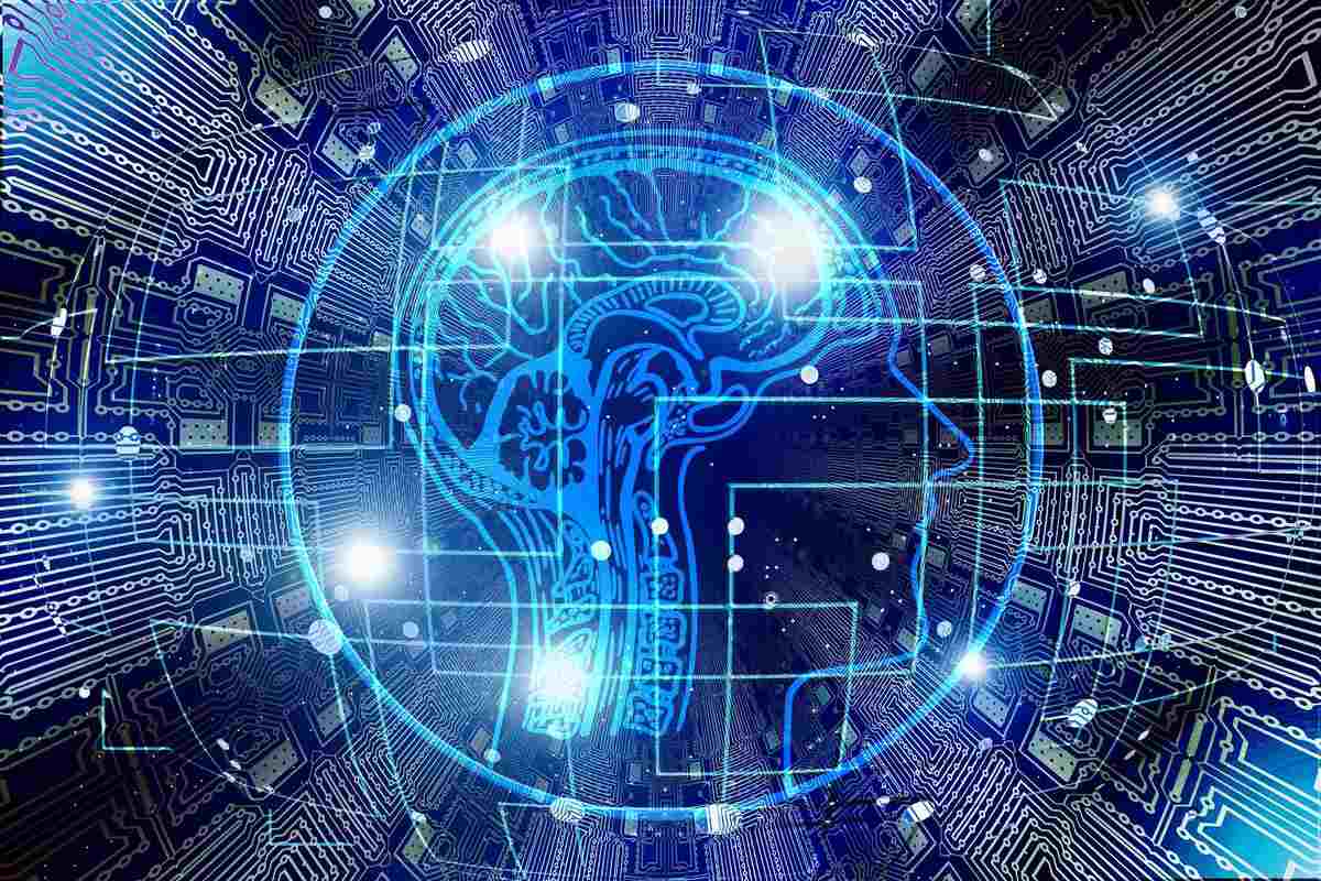 Digital human head profile overlaid with a glowing blue brain and circuit board patterns, representing artificial intelligence and machine learning