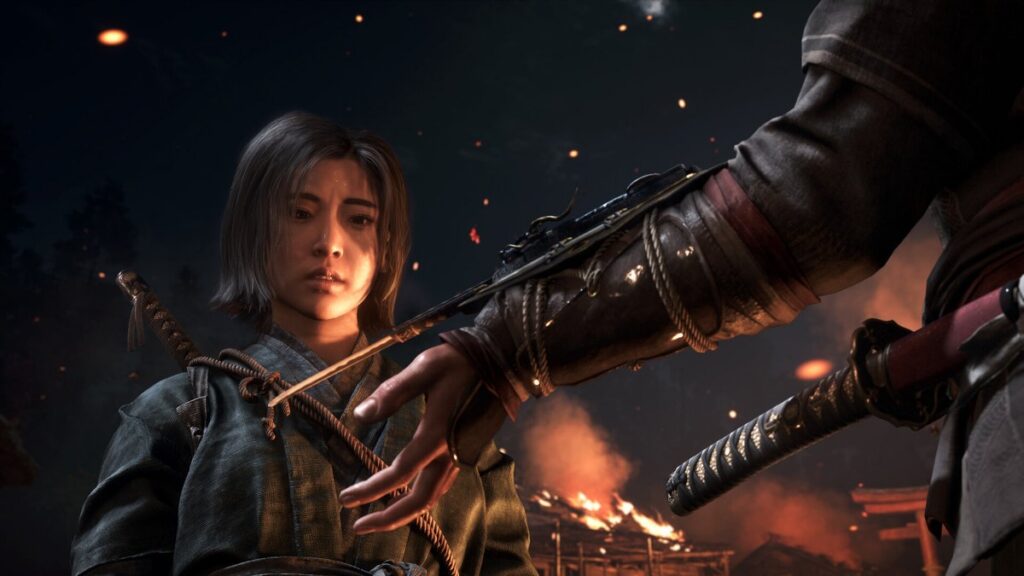 Naoe and Yasuke in a tense nighttime confrontation in feudal Japan, with a burning building in the background