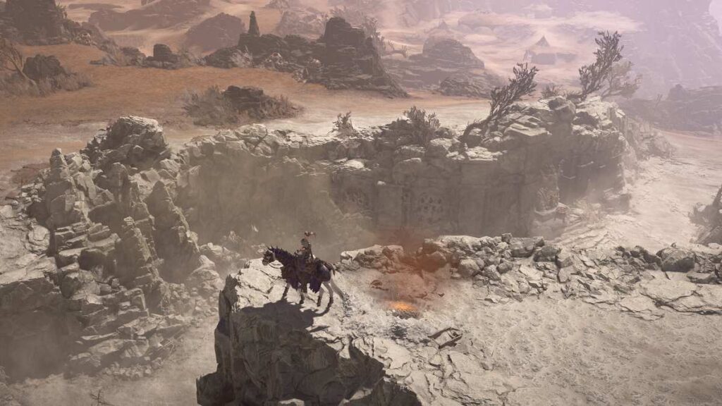 A mounted knight surveying a desert ruin under a hazy sky