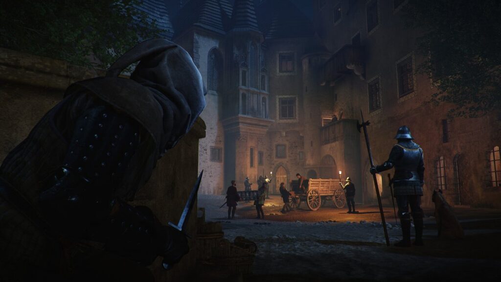 A hooded figure observing a torch-lit medieval courtyard at night